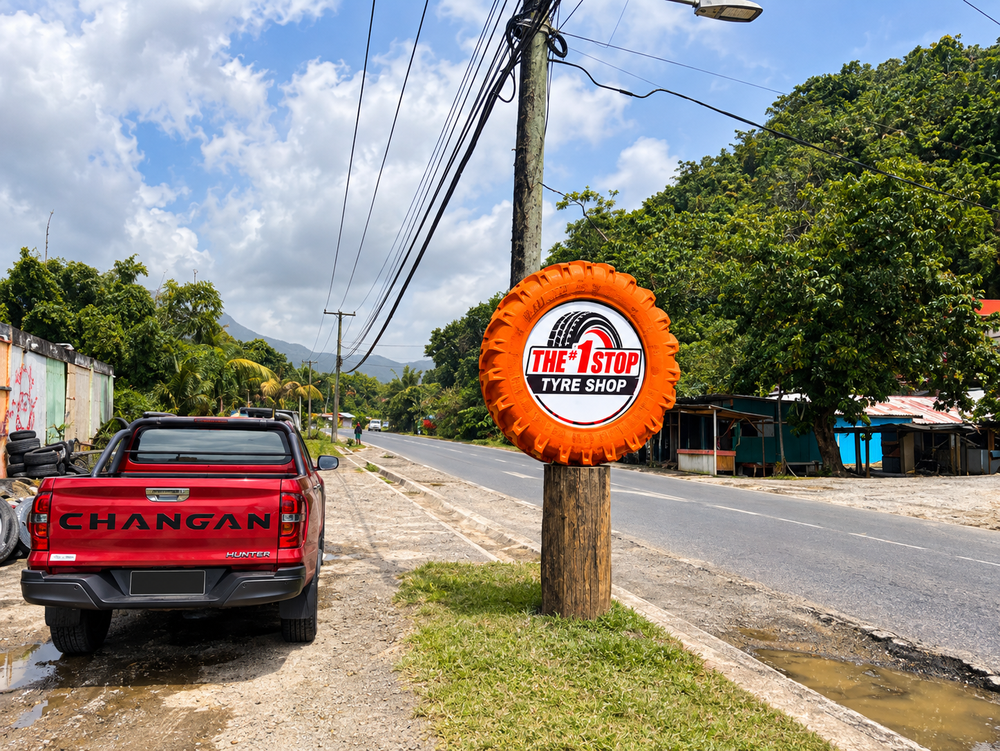 The #1 Stop Tyre Shop roadside sign on Bexon Highway
